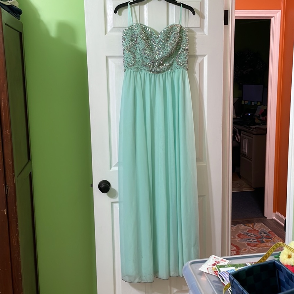 Strapless My Michelle soft green formal.